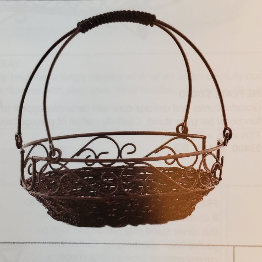 Celebrating Home Oval Metal Basket with handles and scroll design. New